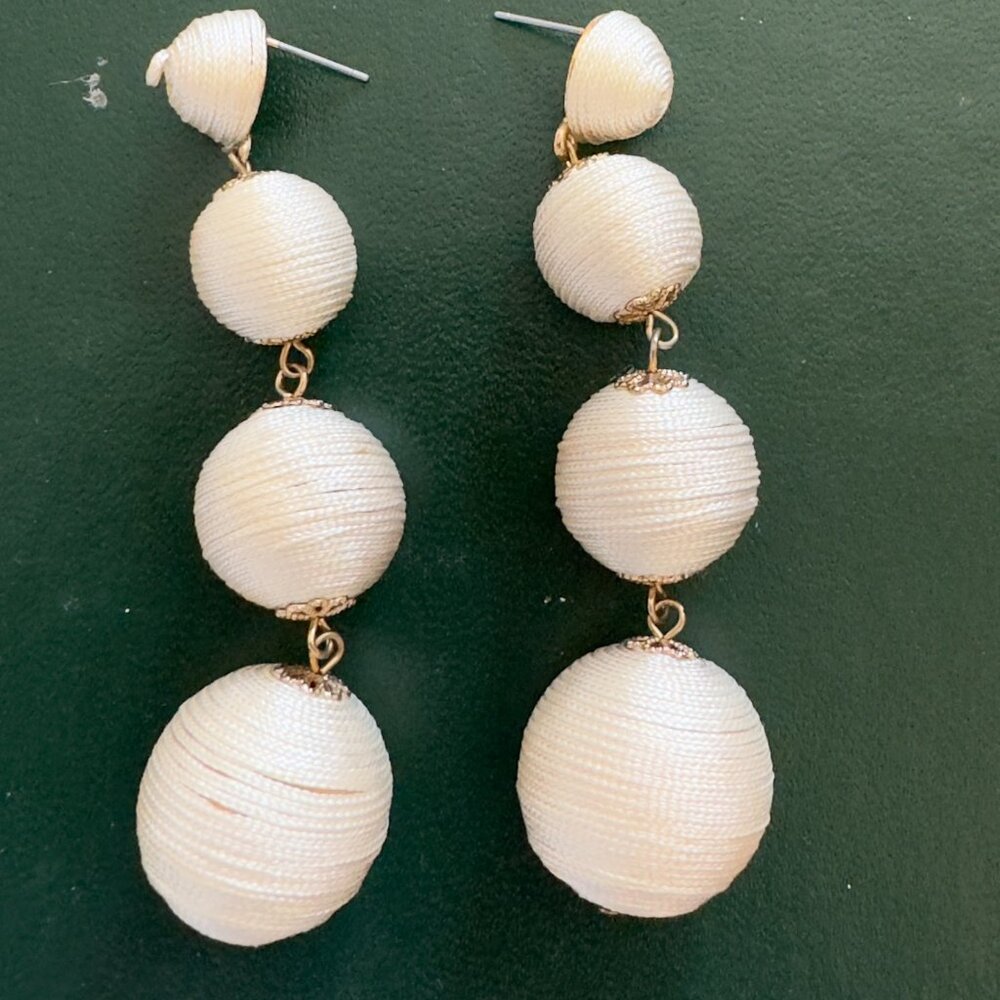 beige BaubleBar drop ball earrings